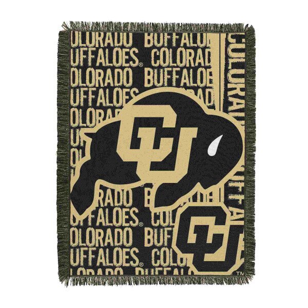 Colorado Buffaloes woven blanket with large buffalo logo and repeating team text, fully laid out with fringed edges.